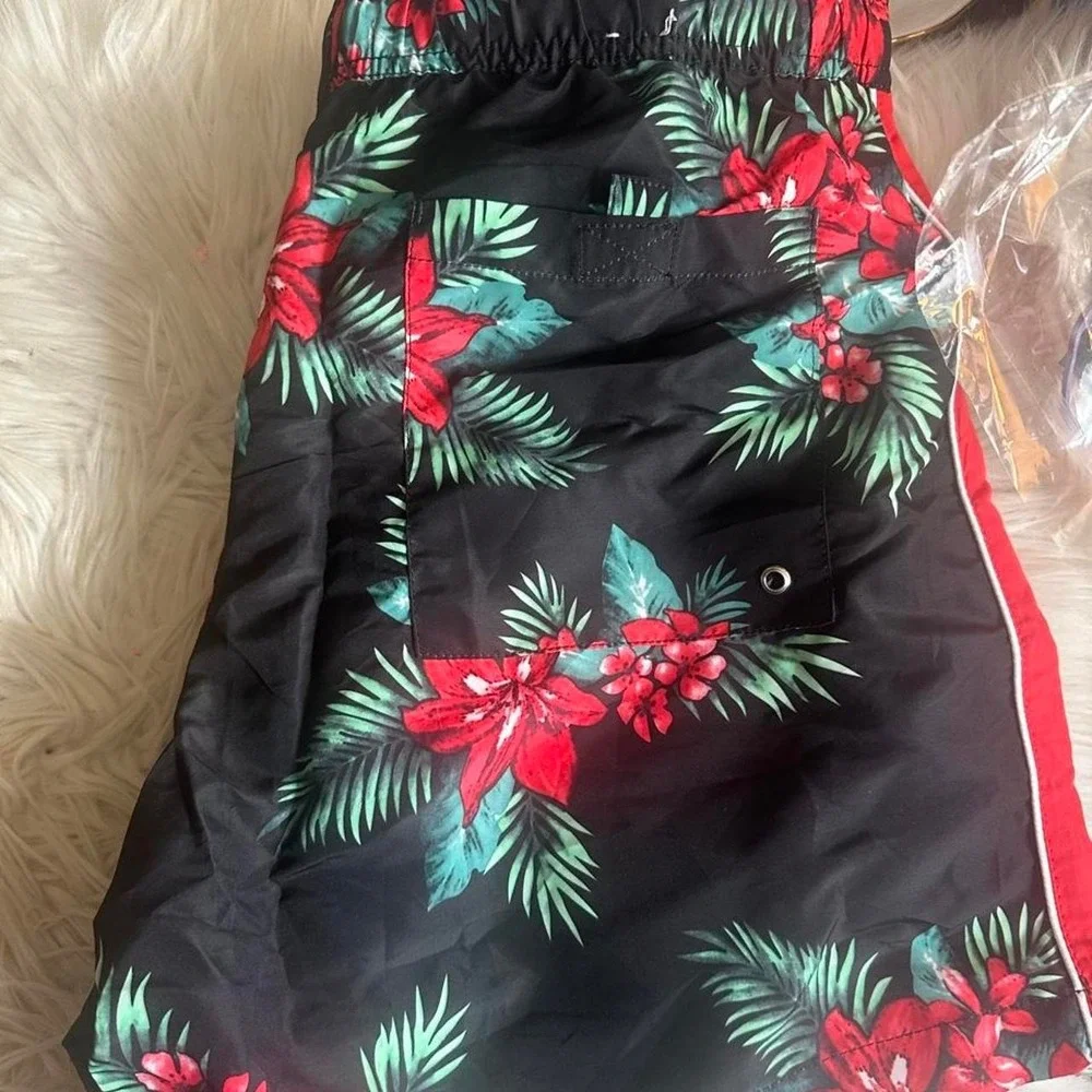 Forever 21 red and green floral swim shorts with white trim, size XL